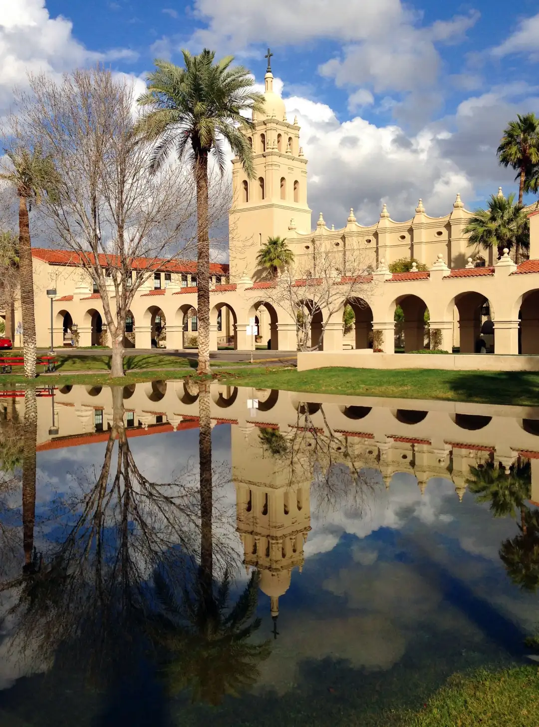 Brophy’s chapel tower, palms, and entry arches