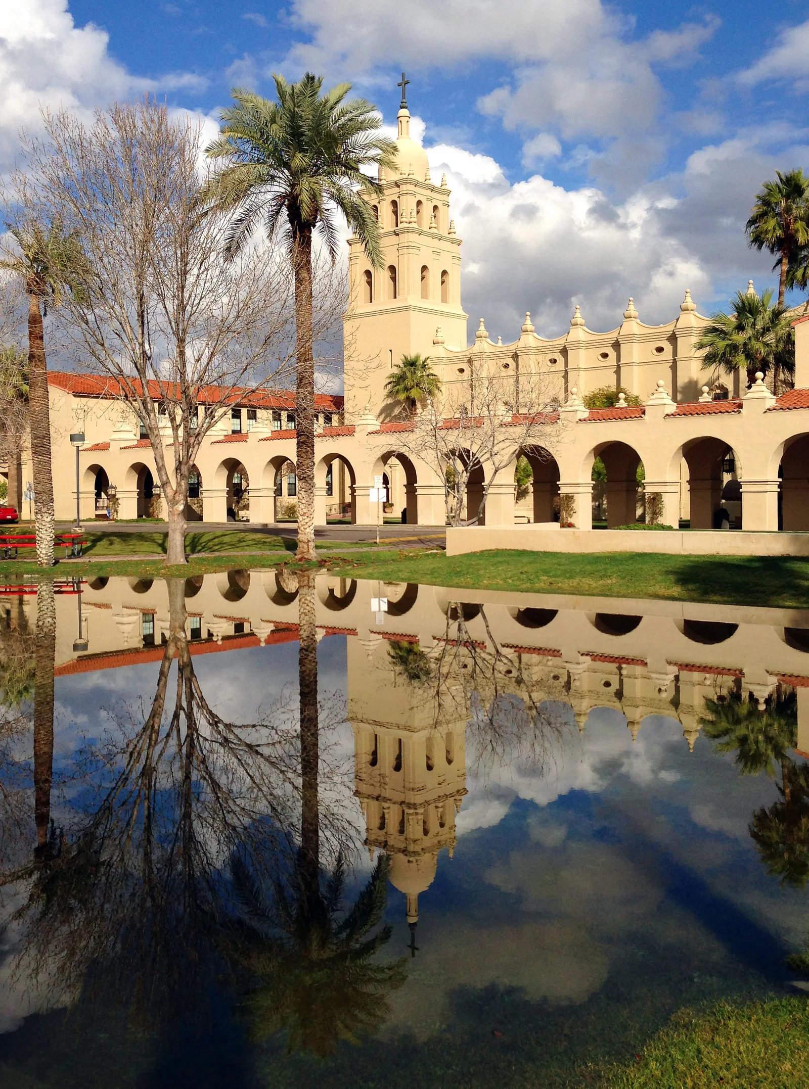 Brophy’s chapel tower, palms, and entry arches